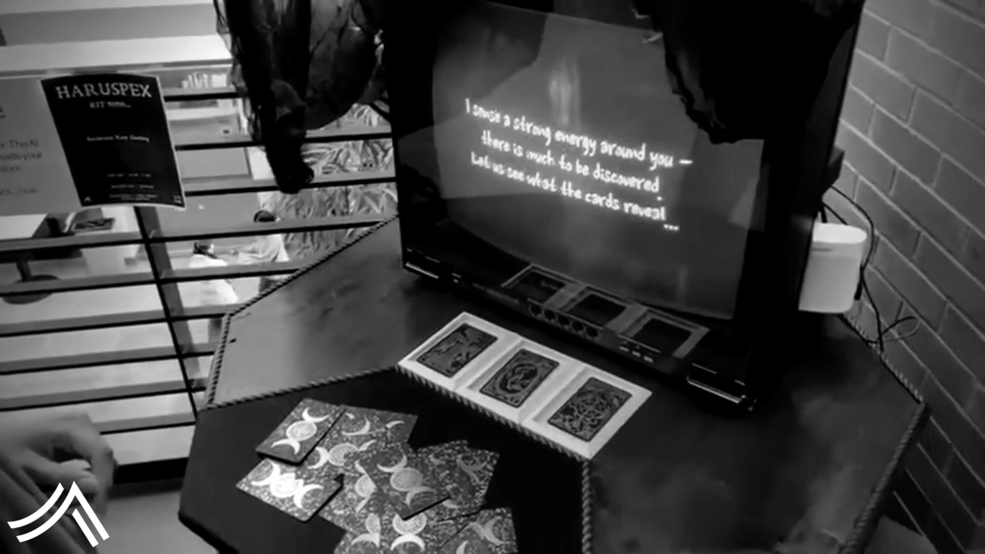 Haruspex running on a CRT, with three tarot cards laid out in front